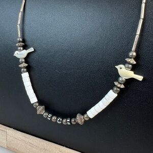 Vintage Liquid Silvertone barrel clasp shell bird accent necklace